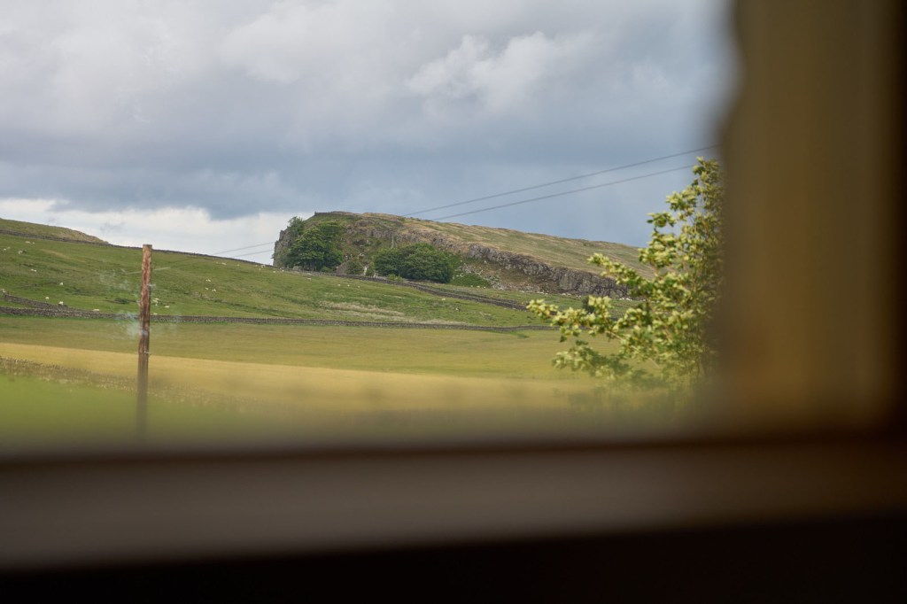 View from Hadrians wall Huts Sauna Window of steel rig